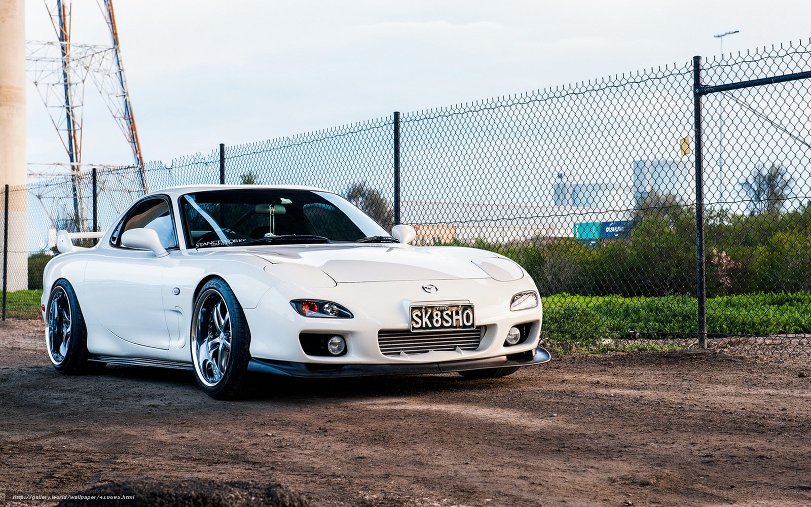 White Mazda RX-7 sports car