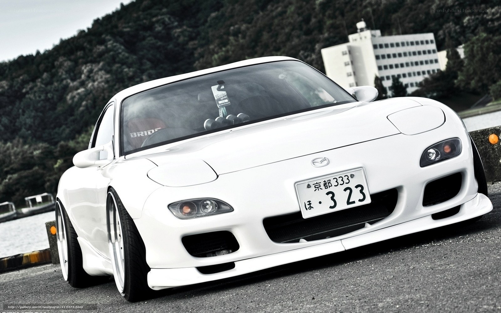 White Mazda RX-7 sports car
