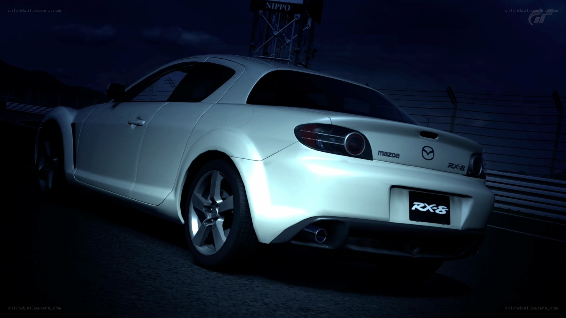 White Mazda RX-8 at night