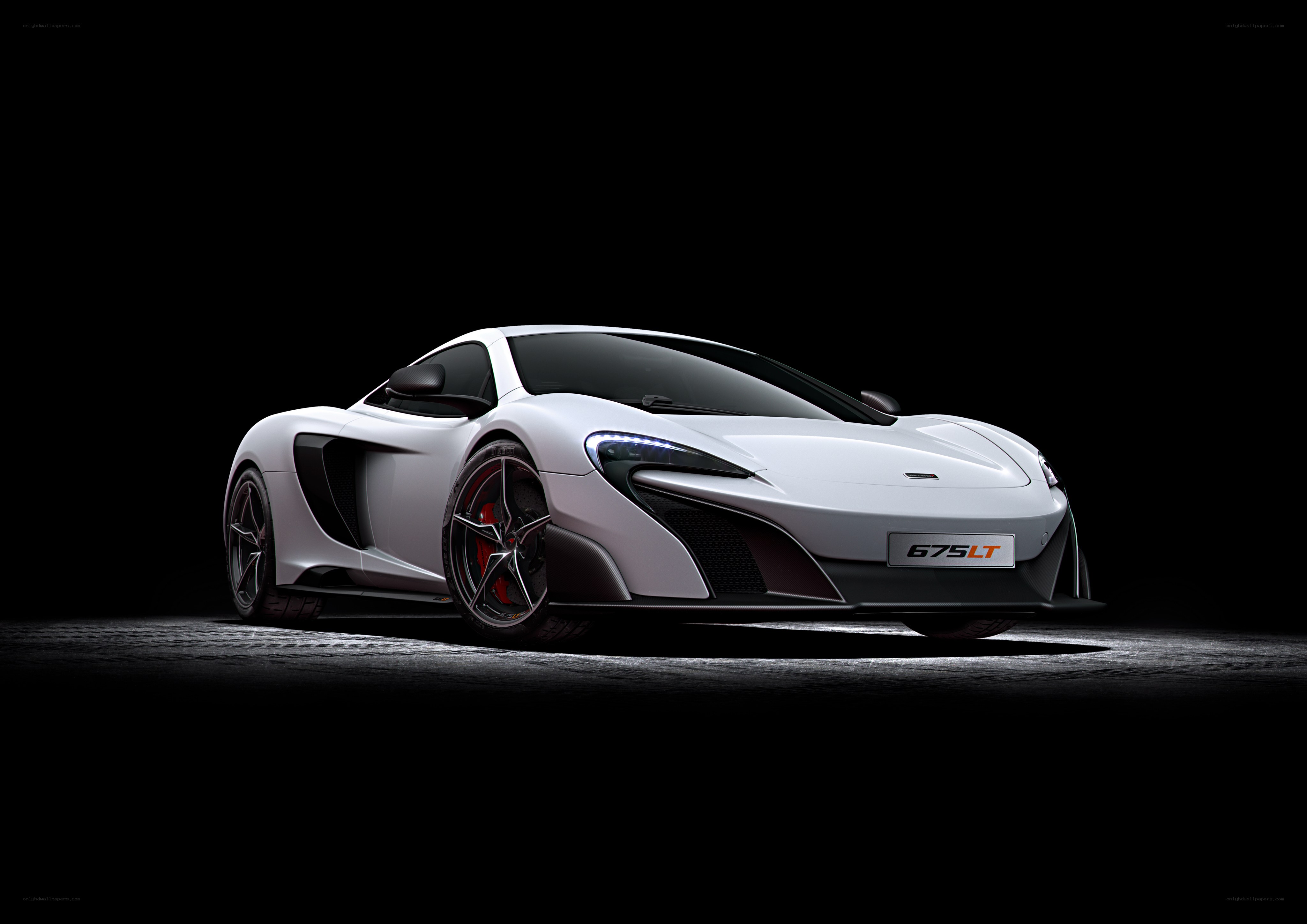 White McLaren 675LT sports car