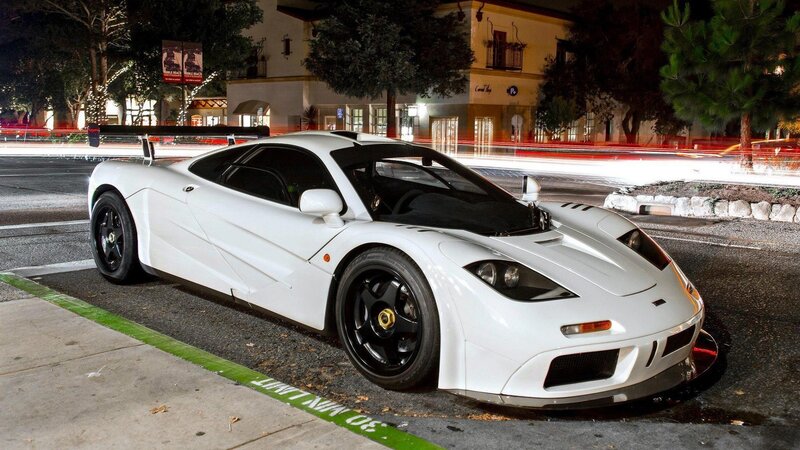 white McLaren F1 parked at night