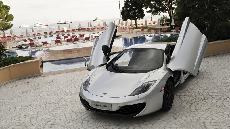 White McLaren MP4-12C by the pool