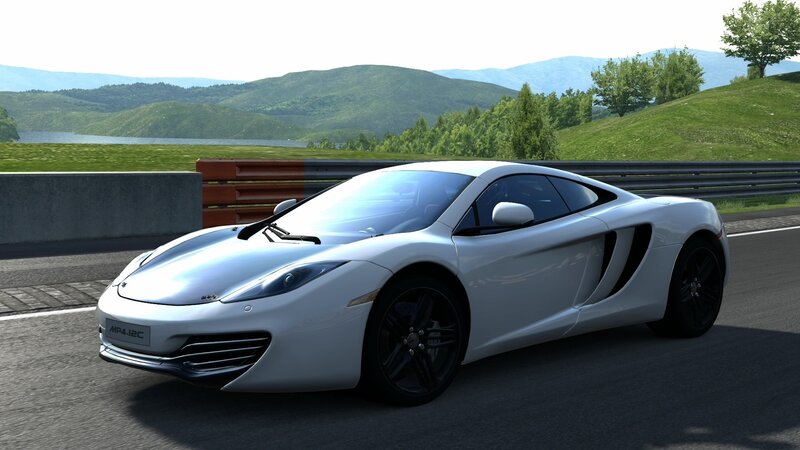 White McLaren MP4-12C on track