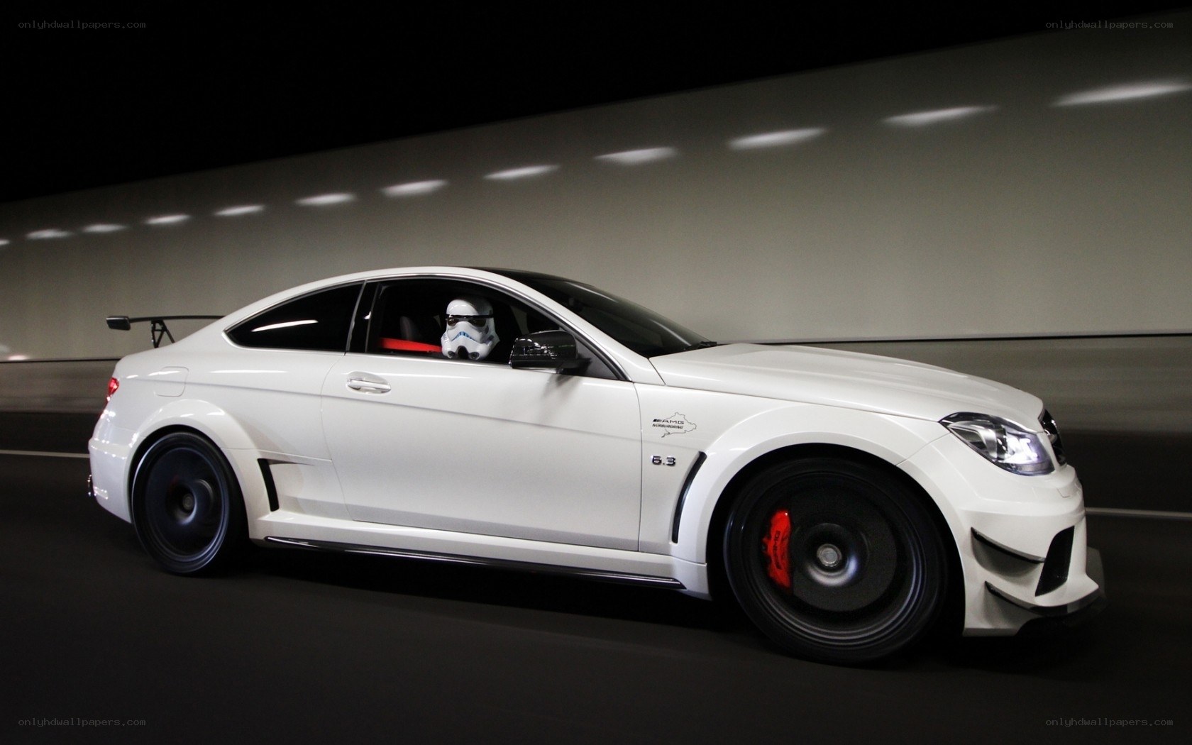 White Mercedes-AMG C63 in tunnel