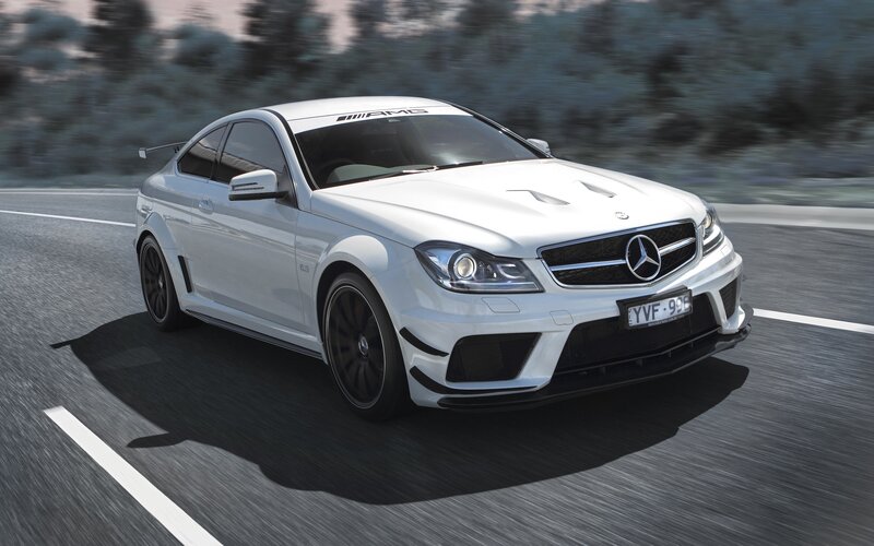 White Mercedes-AMG C63 on road