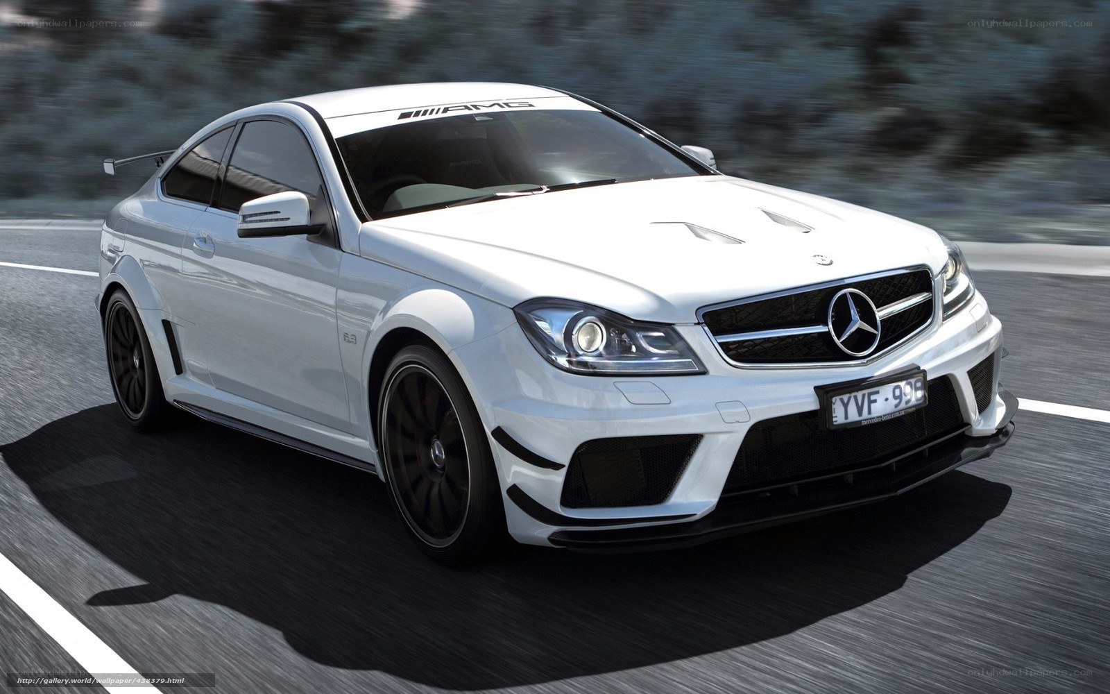 White Mercedes-AMG C63 on road
