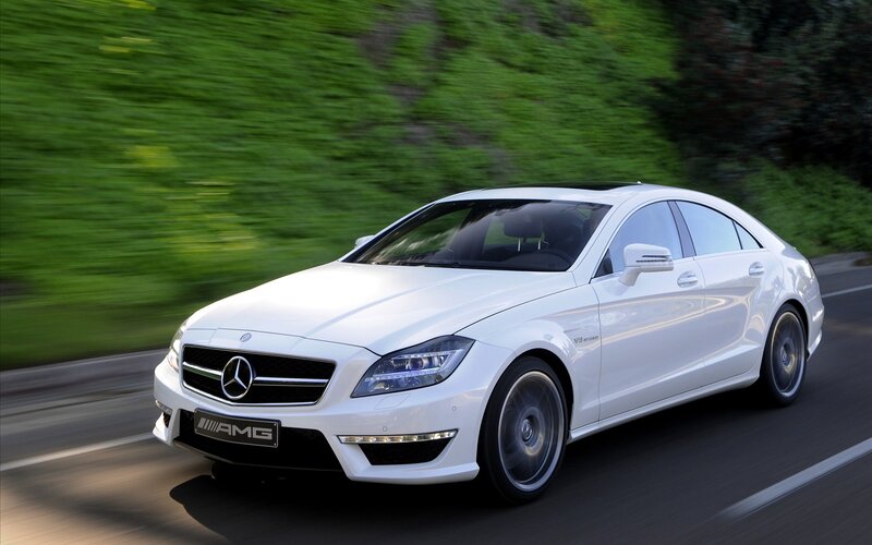 White Mercedes-AMG CLS in motion