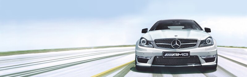 White Mercedes-AMG on a racetrack