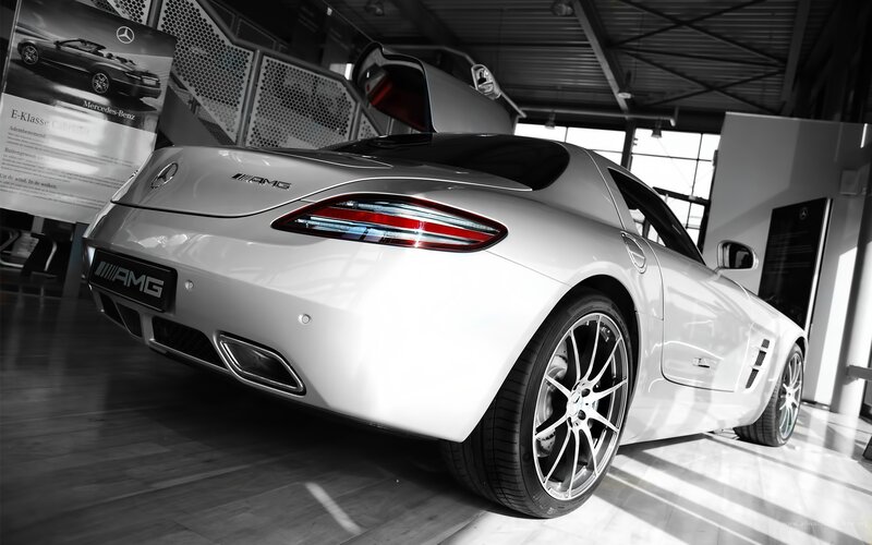 White Mercedes-AMG SLS in showroom