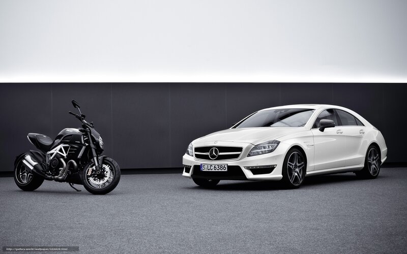 White Mercedes and Black Motorcycle