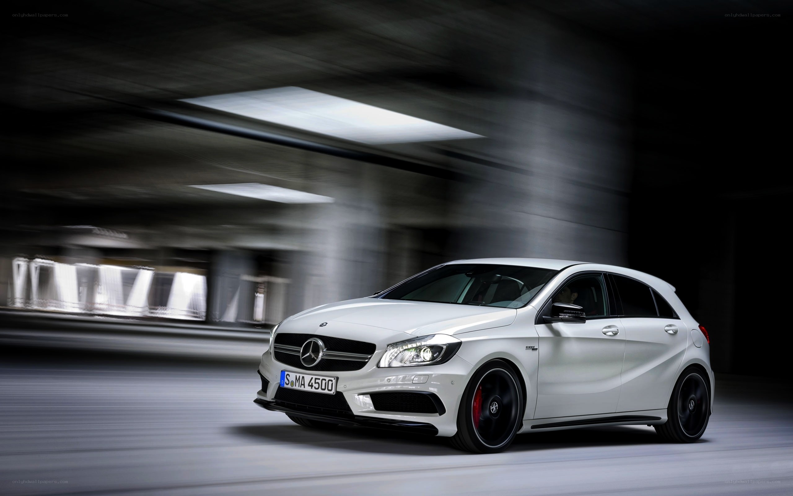 White Mercedes-Benz A45 AMG in motion