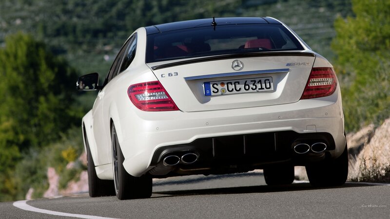 White Mercedes-Benz C63 AMG on road