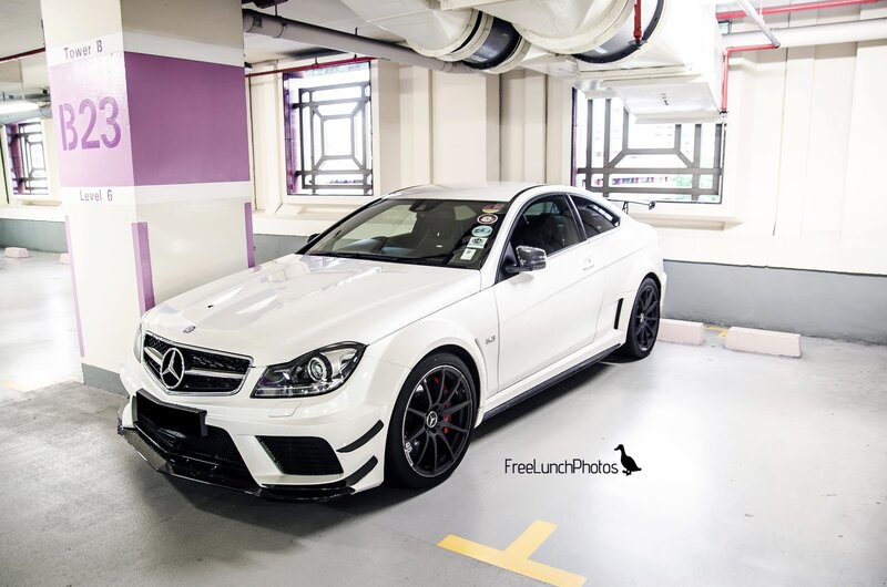 White Mercedes-Benz C63 AMG parked