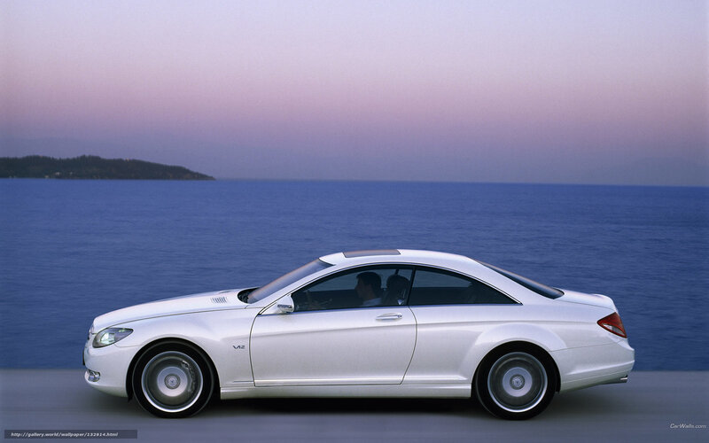 White Mercedes-Benz CL55 AMG by the sea
