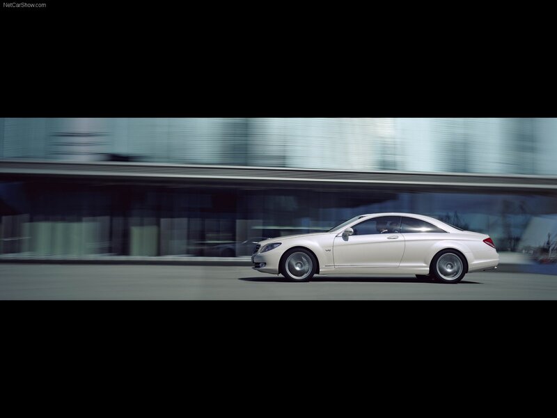 white mercedes-benz cl600 in motion