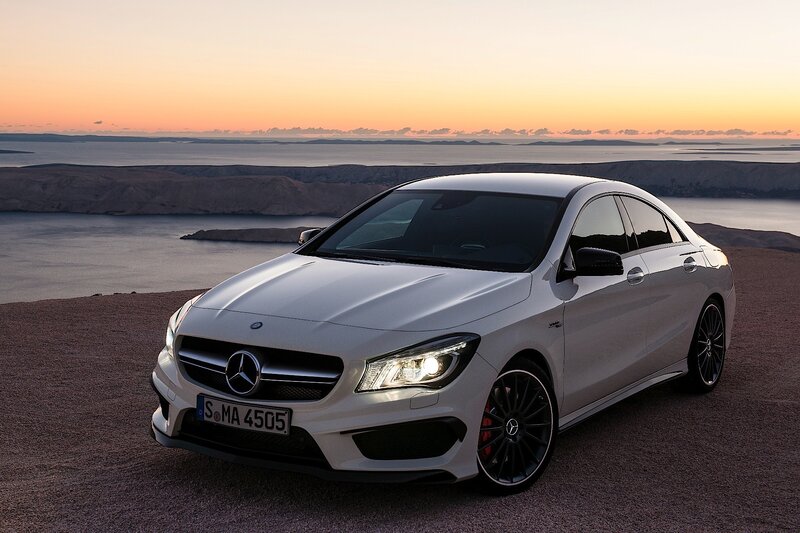 White Mercedes-Benz CLA at sunset