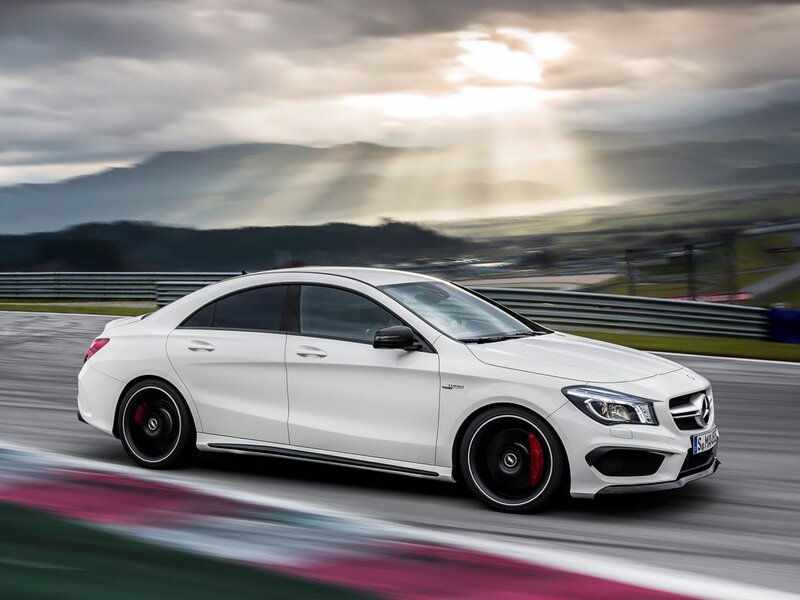 White Mercedes-Benz CLA45 on a racetrack