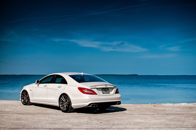 White Mercedes-Benz CLS 63 on beach