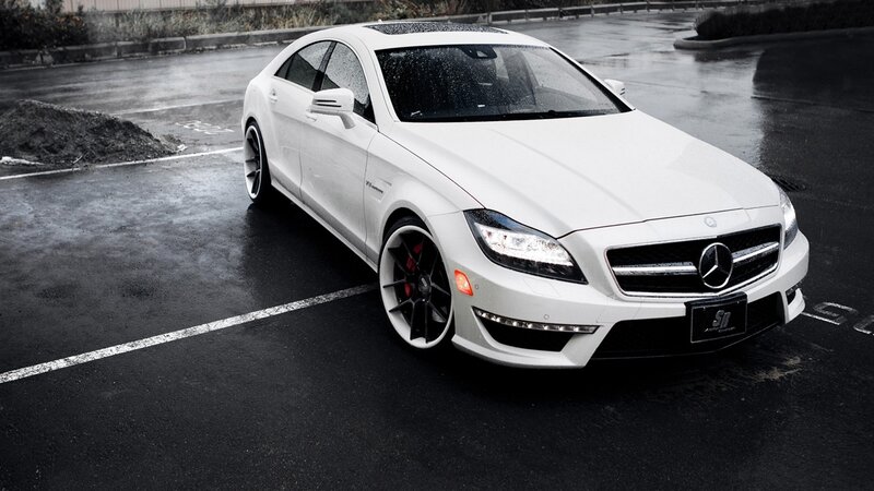 white mercedes-benz cls parked
