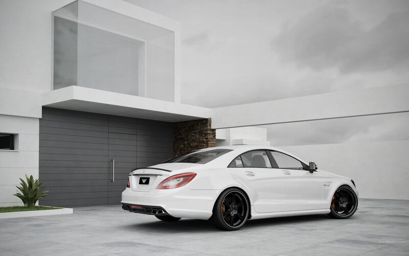 white mercedes-benz cls parked outside