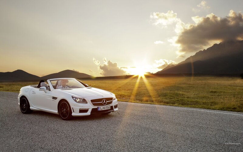 White Mercedes-Benz convertible at sunset