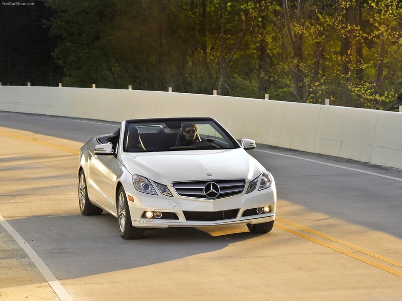 White Mercedes-Benz convertible on road