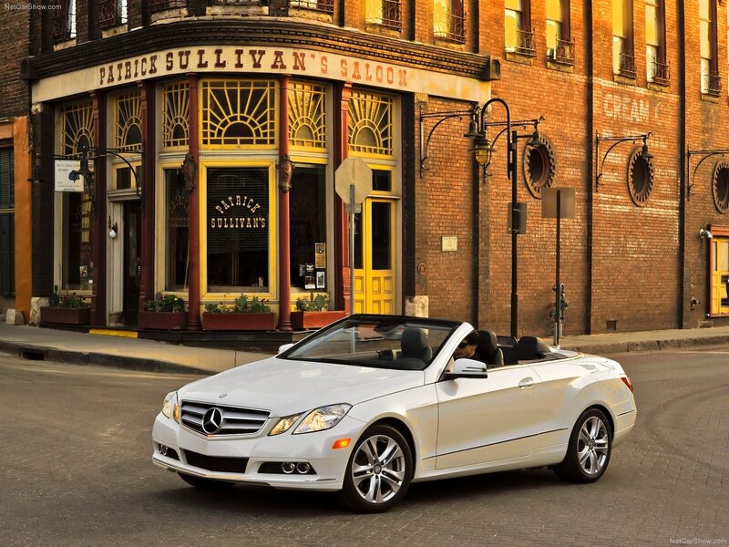 White Mercedes-Benz convertible on street