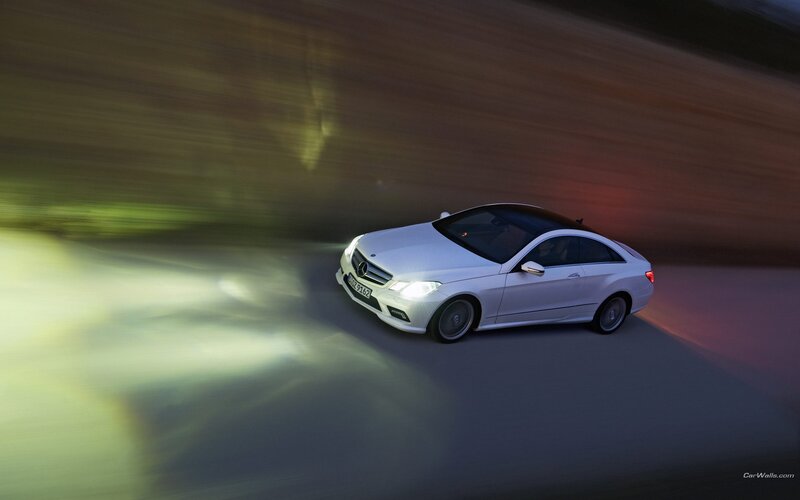 White Mercedes-Benz driving at night