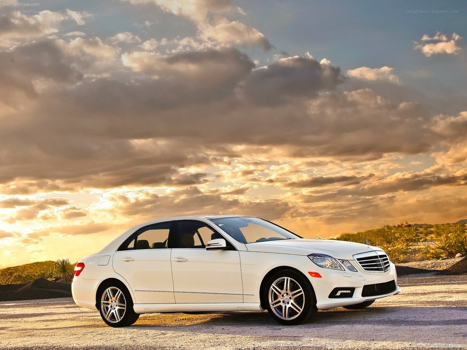 White Mercedes-Benz E-Class at sunset