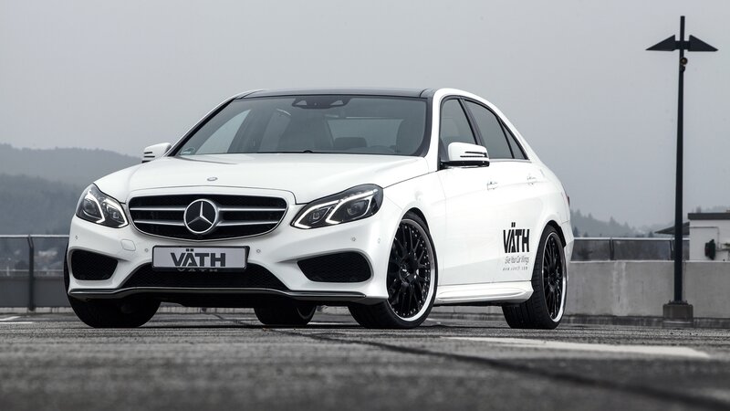 white mercedes-benz e-class sedan
