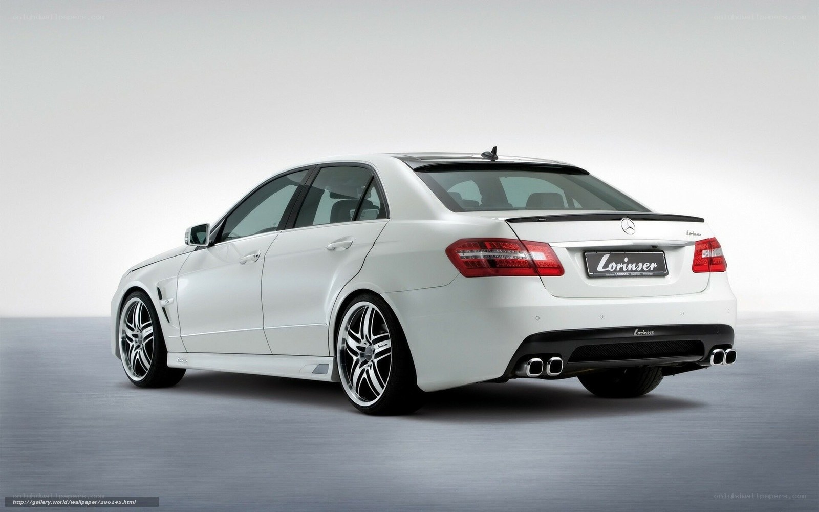 white mercedes-benz e-class sedan