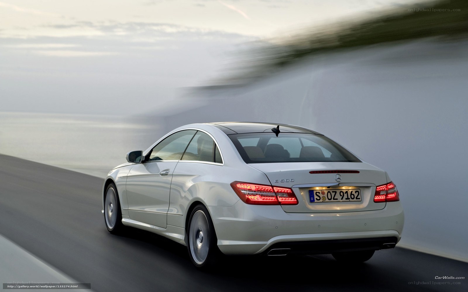 white mercedes-benz e500 coupe