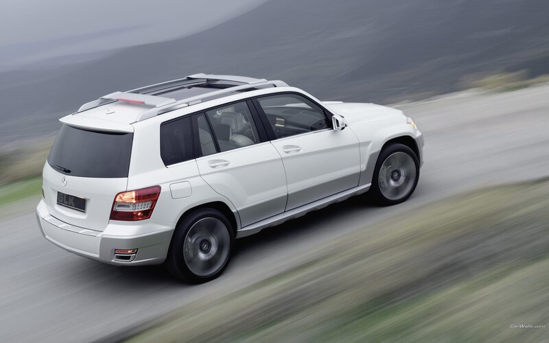 white mercedes-benz glk driving
