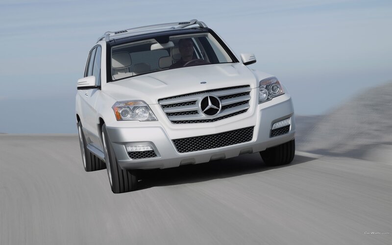 White Mercedes-Benz GLK driving