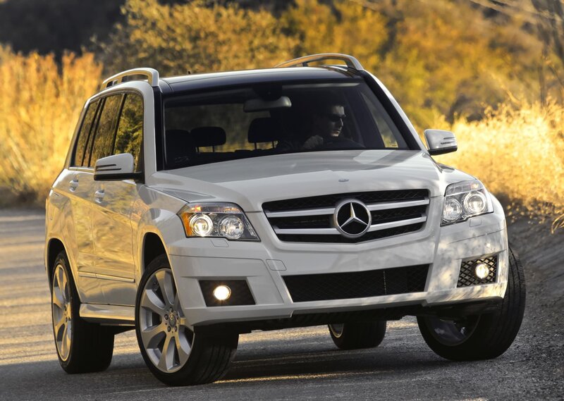 White Mercedes-Benz GLK driving