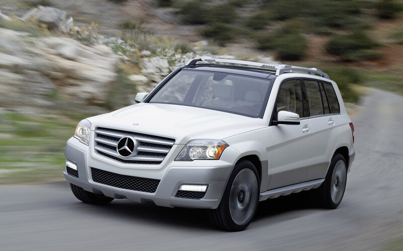 White Mercedes-Benz GLK driving on road