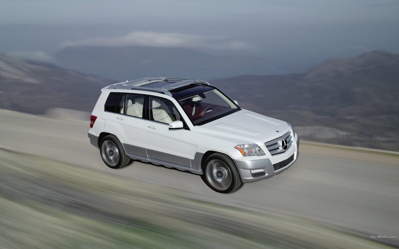White Mercedes-Benz GLK driving on road