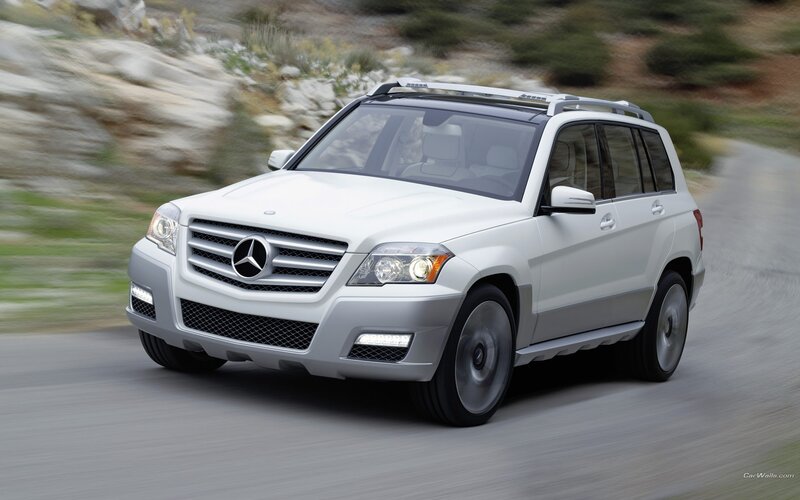 White Mercedes-Benz GLK driving on road