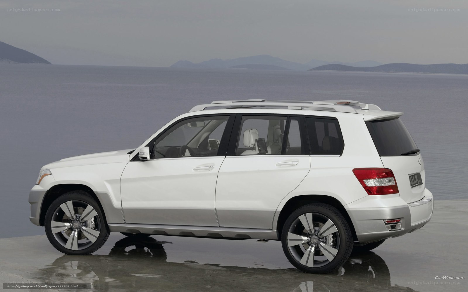 White Mercedes-Benz GLK parked by water