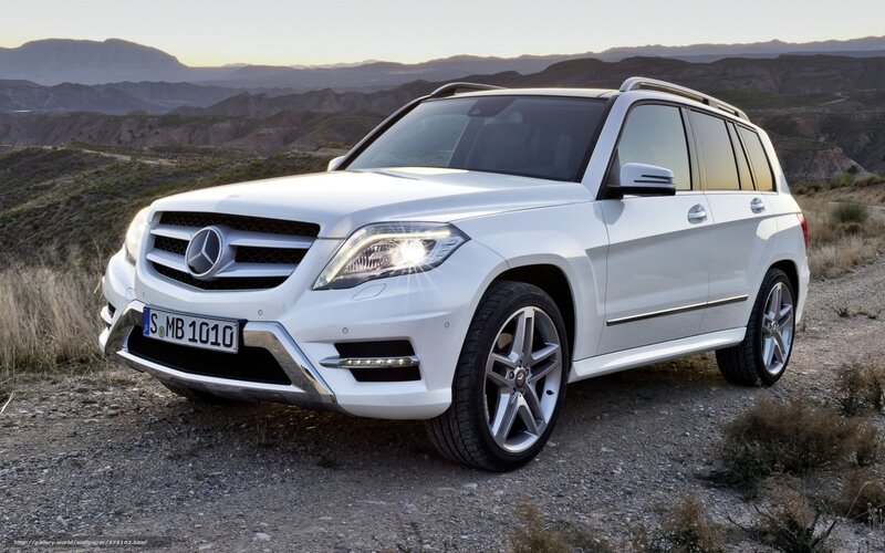 White Mercedes-Benz GLK parked in desert
