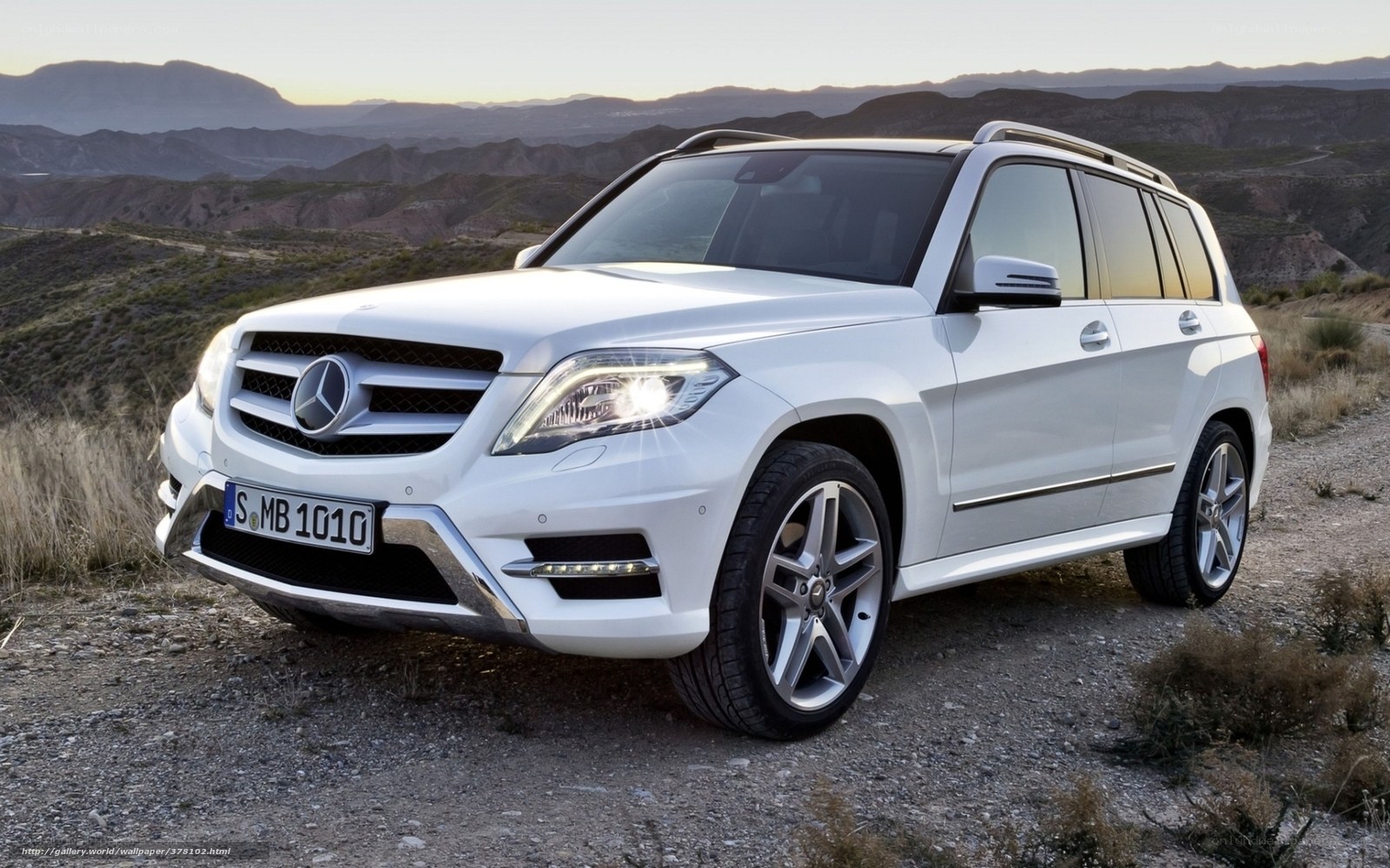 White Mercedes-Benz GLK parked in desert