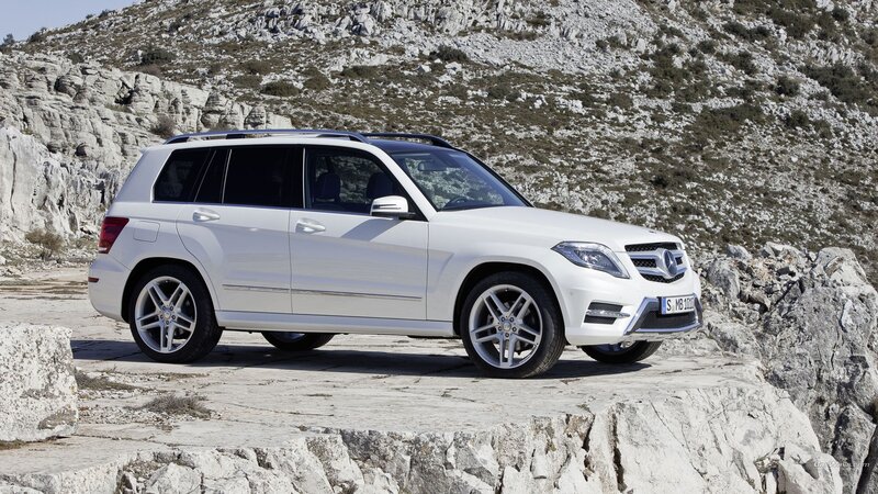 White Mercedes-Benz GLK parked on rocks