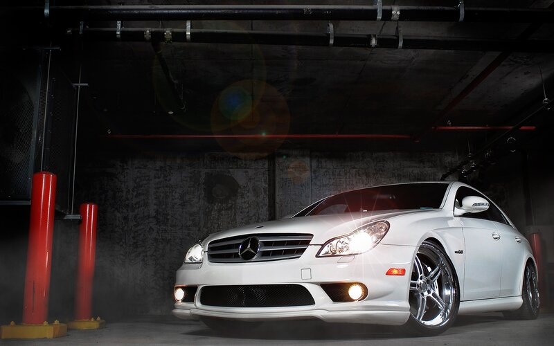 white mercedes-benz in garage