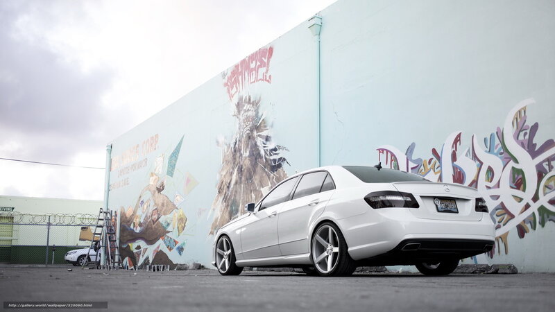 White Mercedes-Benz in urban setting