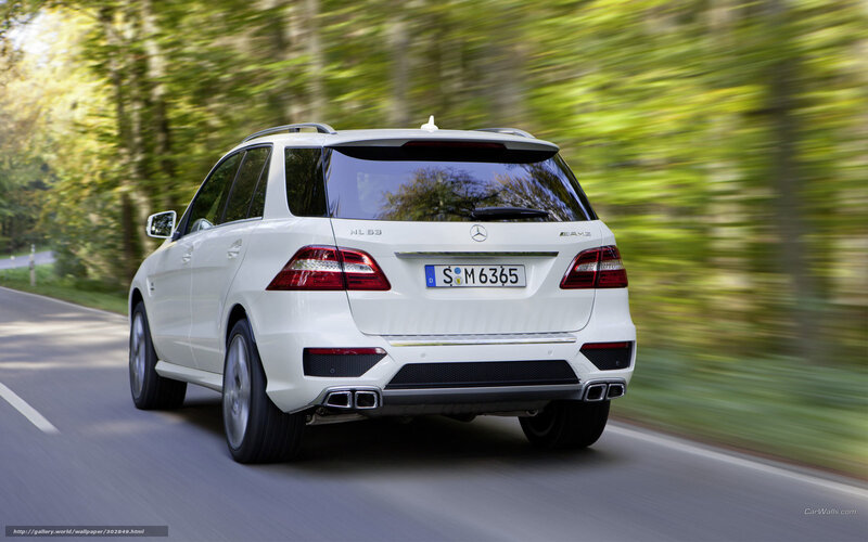 white mercedes-benz ml63 amg driving