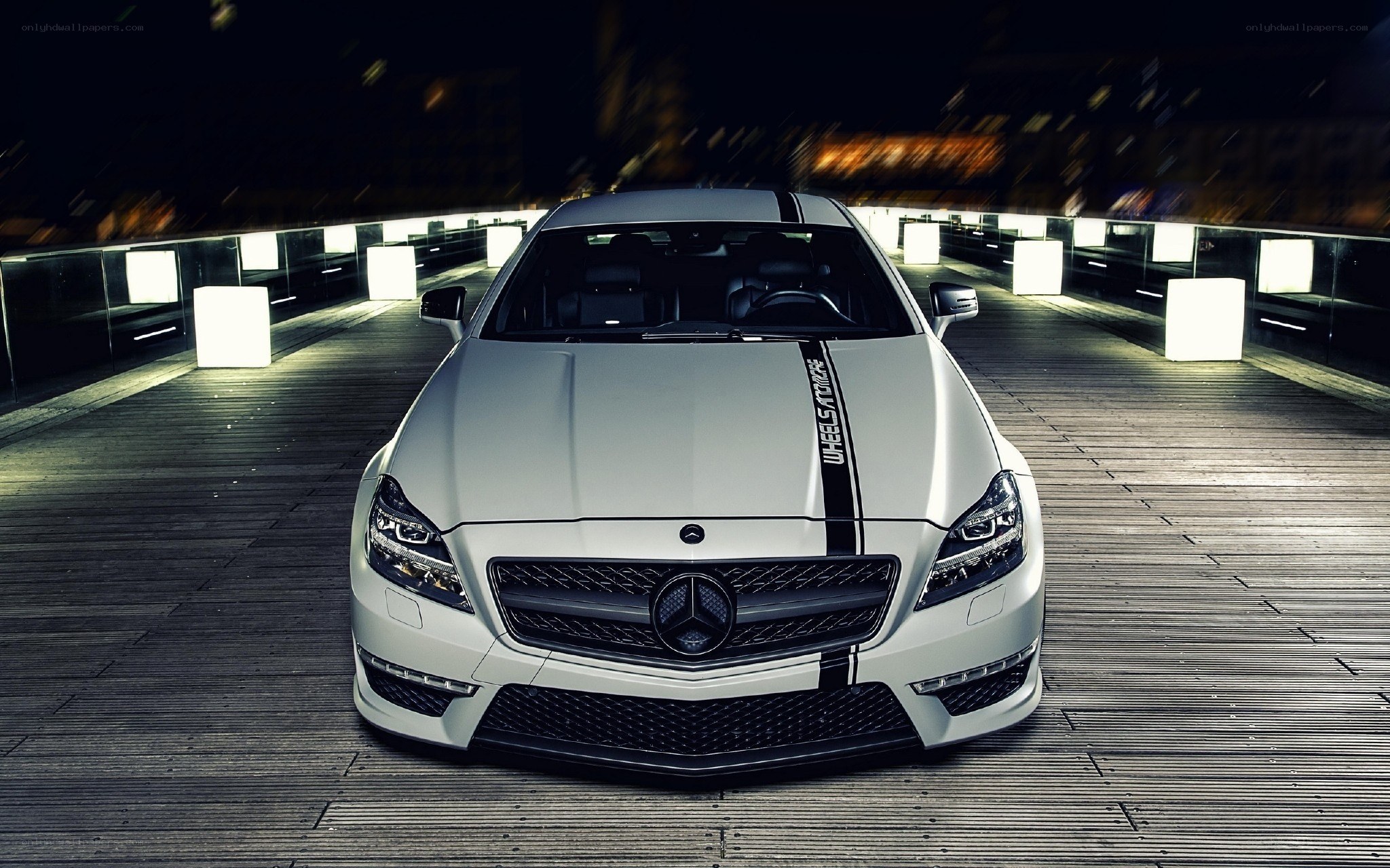 White Mercedes-Benz on a bridge