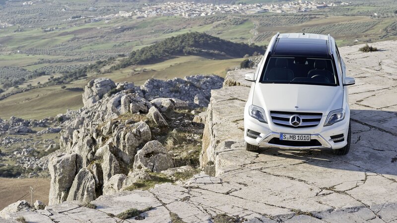 White Mercedes-Benz on a cliff
