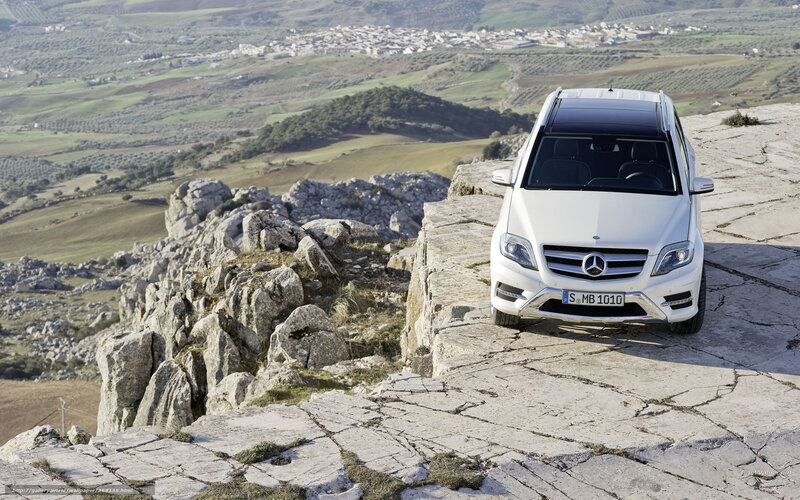 White Mercedes-Benz on a cliff