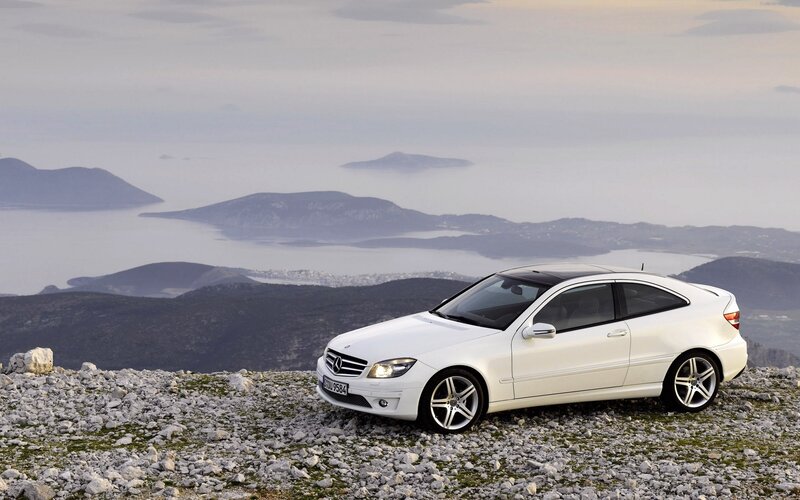 White Mercedes-Benz on a mountain