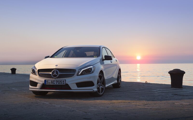 White Mercedes-Benz on a pier